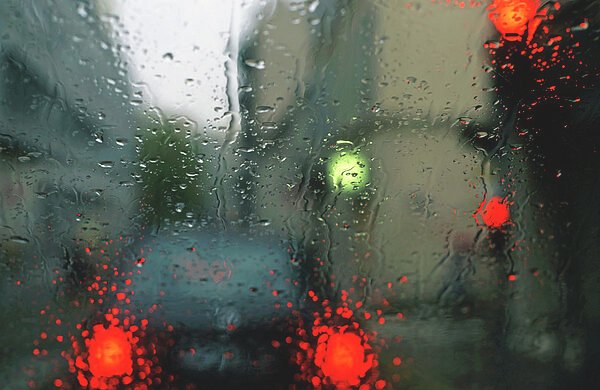 traffic-lights-in-rain-view-through-windscreen-sami-sarkis-6712726